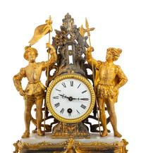 A Gilt Metal Mantel Clock