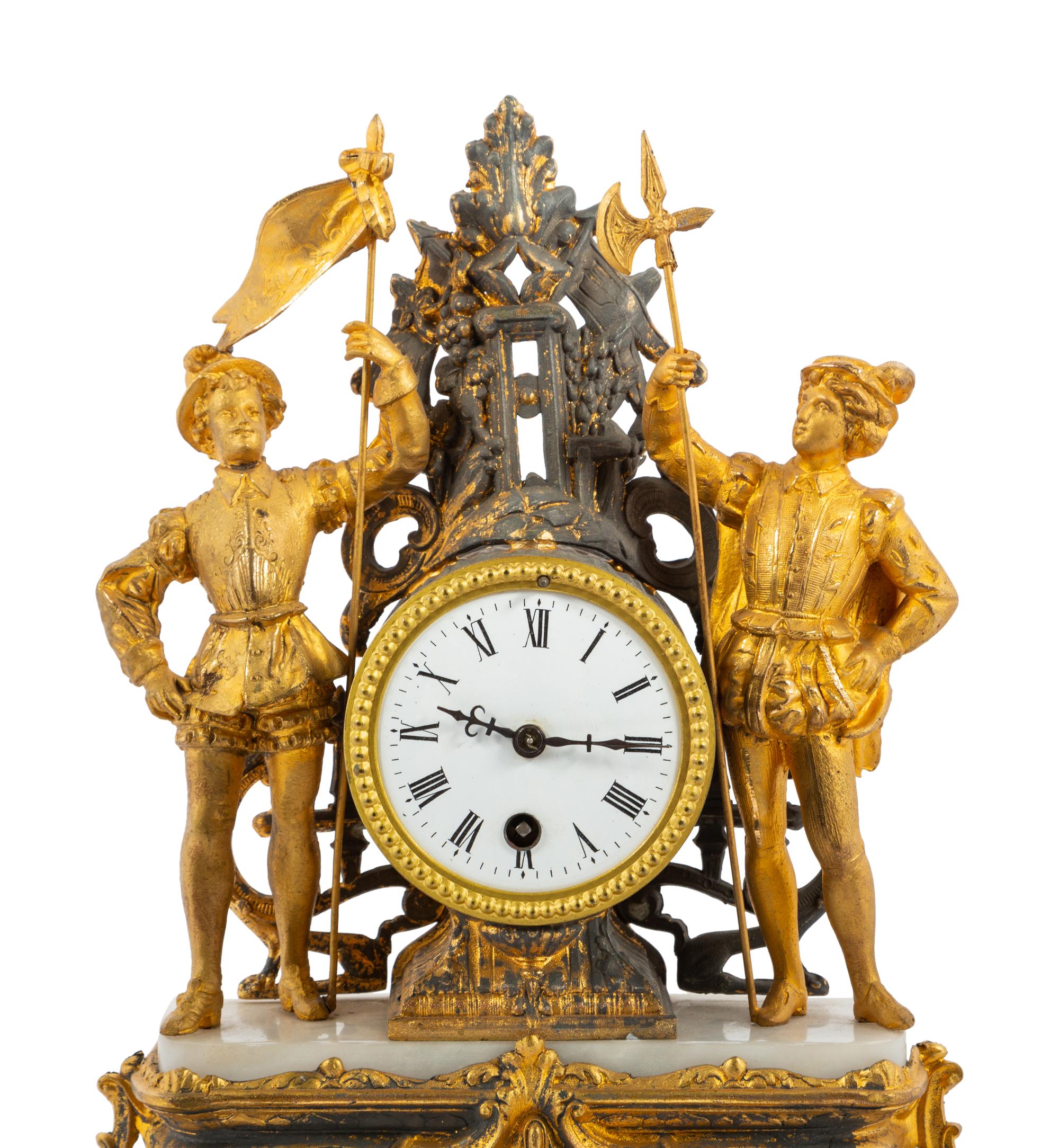 A Gilt Metal Mantel Clock