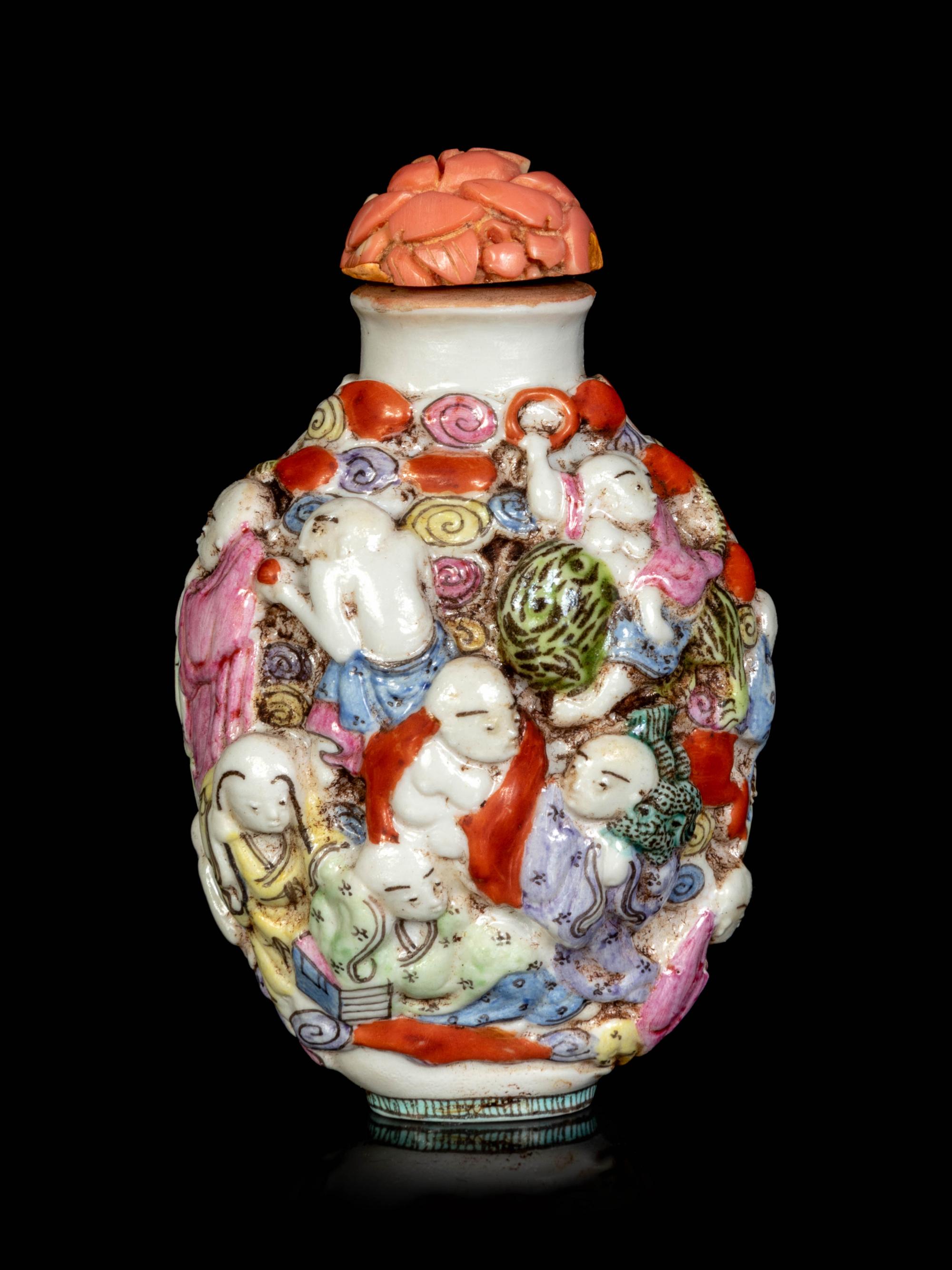 A Chinese Molded Famille Rose Porcelain ‘Luohan’ Snuff Bottle