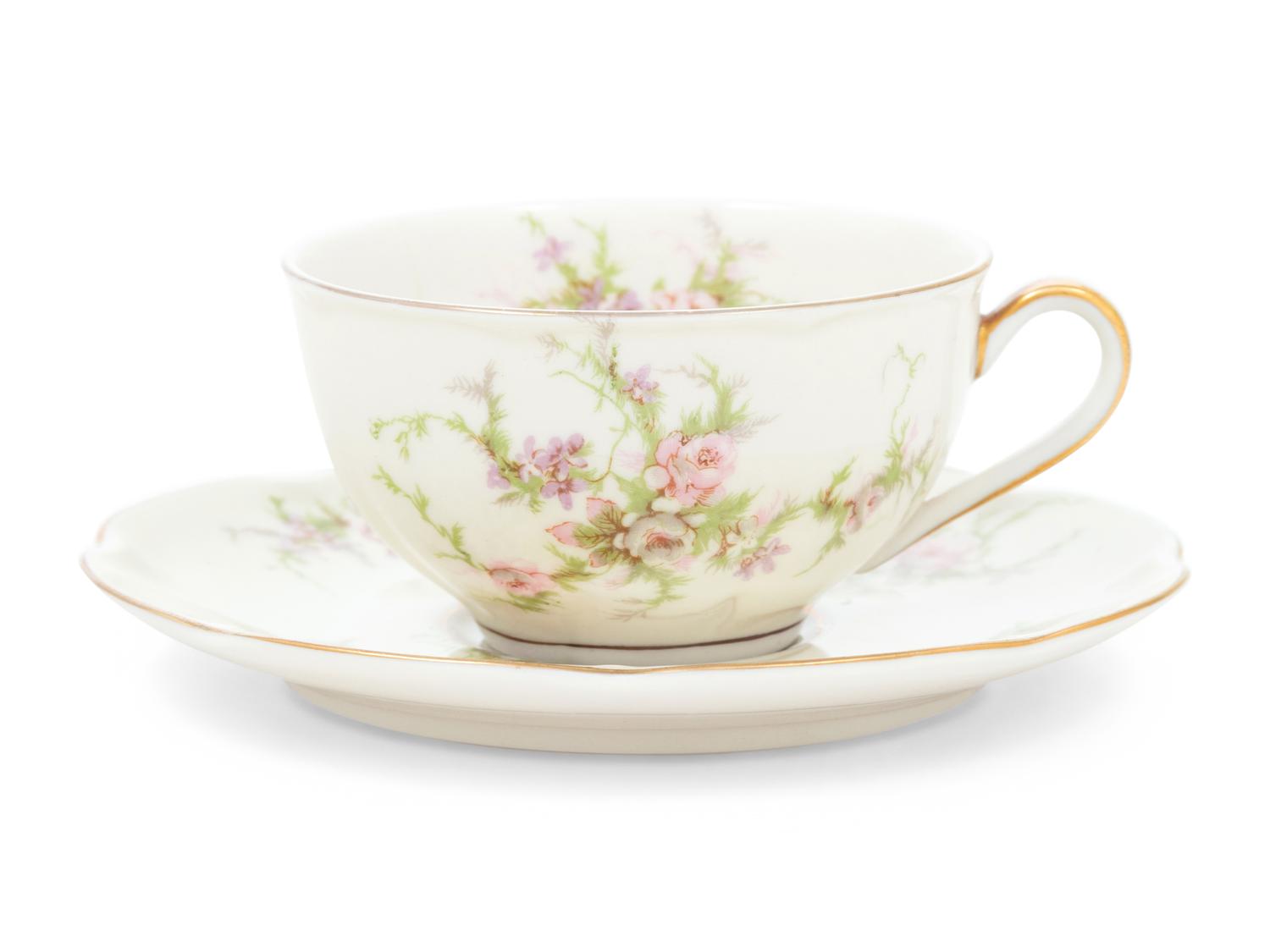 A Theodore Haviland Rosalinde Porcelain Dinner Service