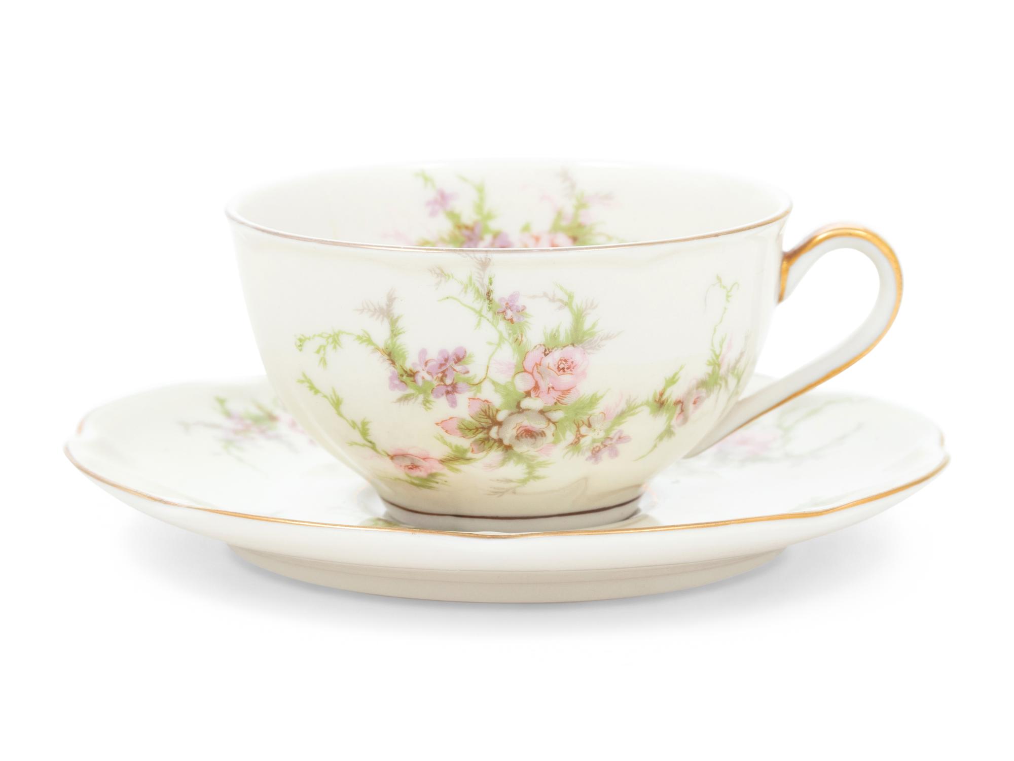 A Theodore Haviland Rosalinde Porcelain Dinner Service