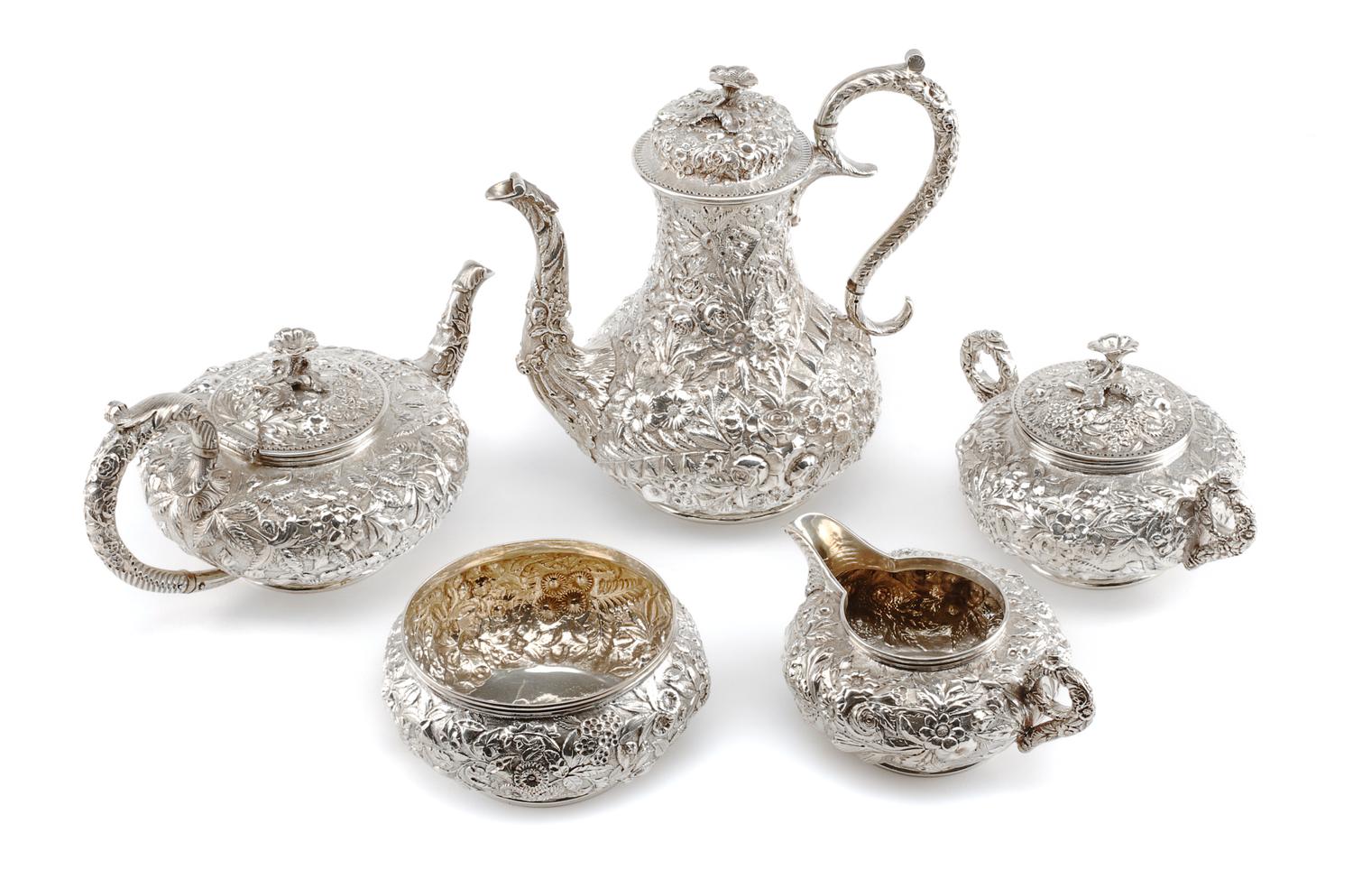 An American Silver Five-Piece Tea and Coffee Service, S. Kirk & Son, Baltimore, MD, Repousse pattern, comprising a teapot, coffee pot,