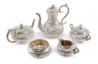 An American Silver Five-Piece Tea and Coffee Service, S. Kirk & Son, Baltimore, MD, Repousse pattern, comprising a teapot, coffee pot,