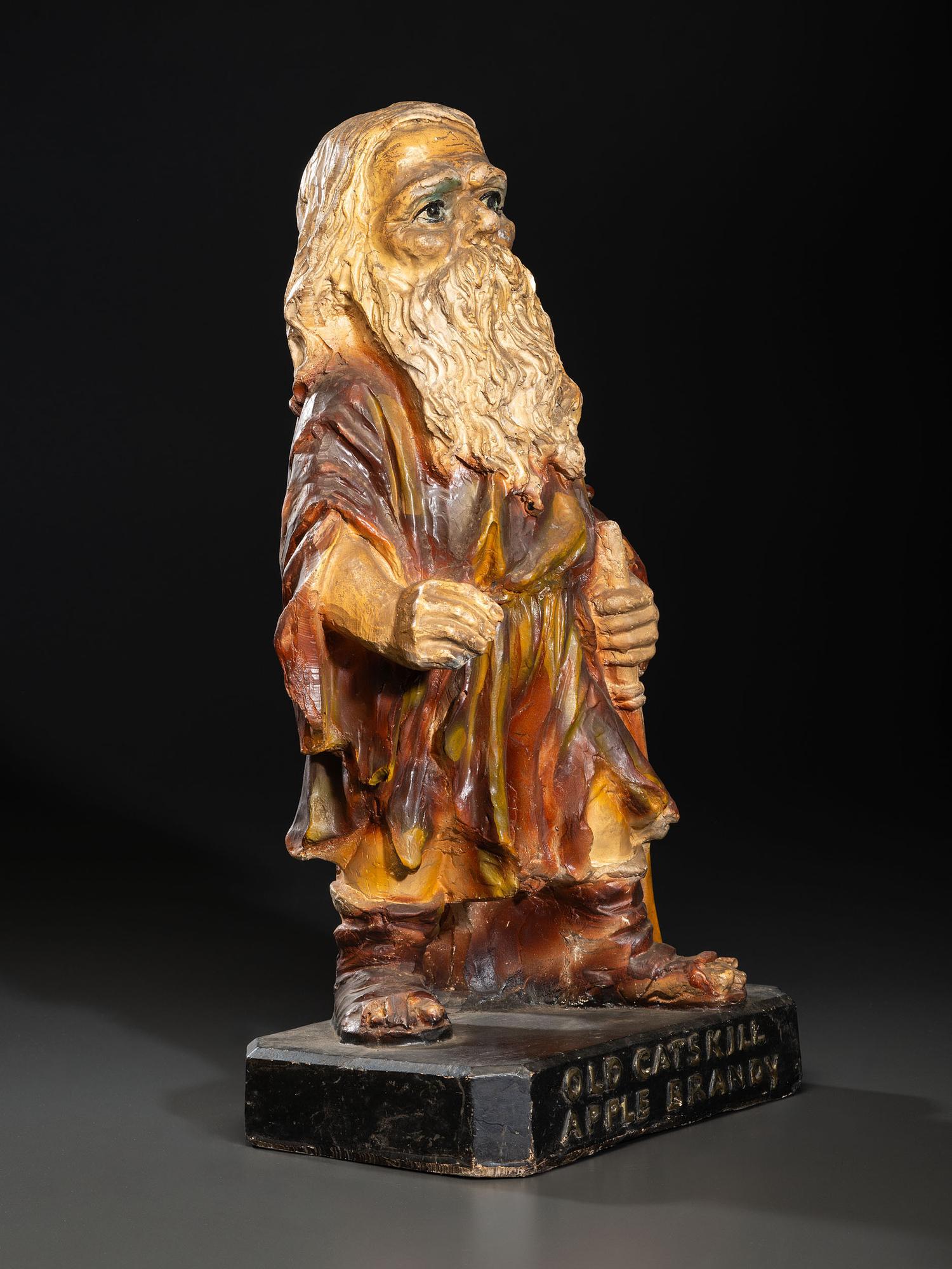 An 'Old Catskill' Apple Brandy Painted Chalkware Countertop Advertising Figure