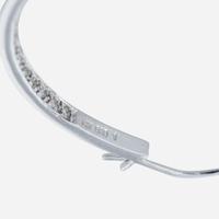 A pair of 14K white gold and diamond hoop earrings