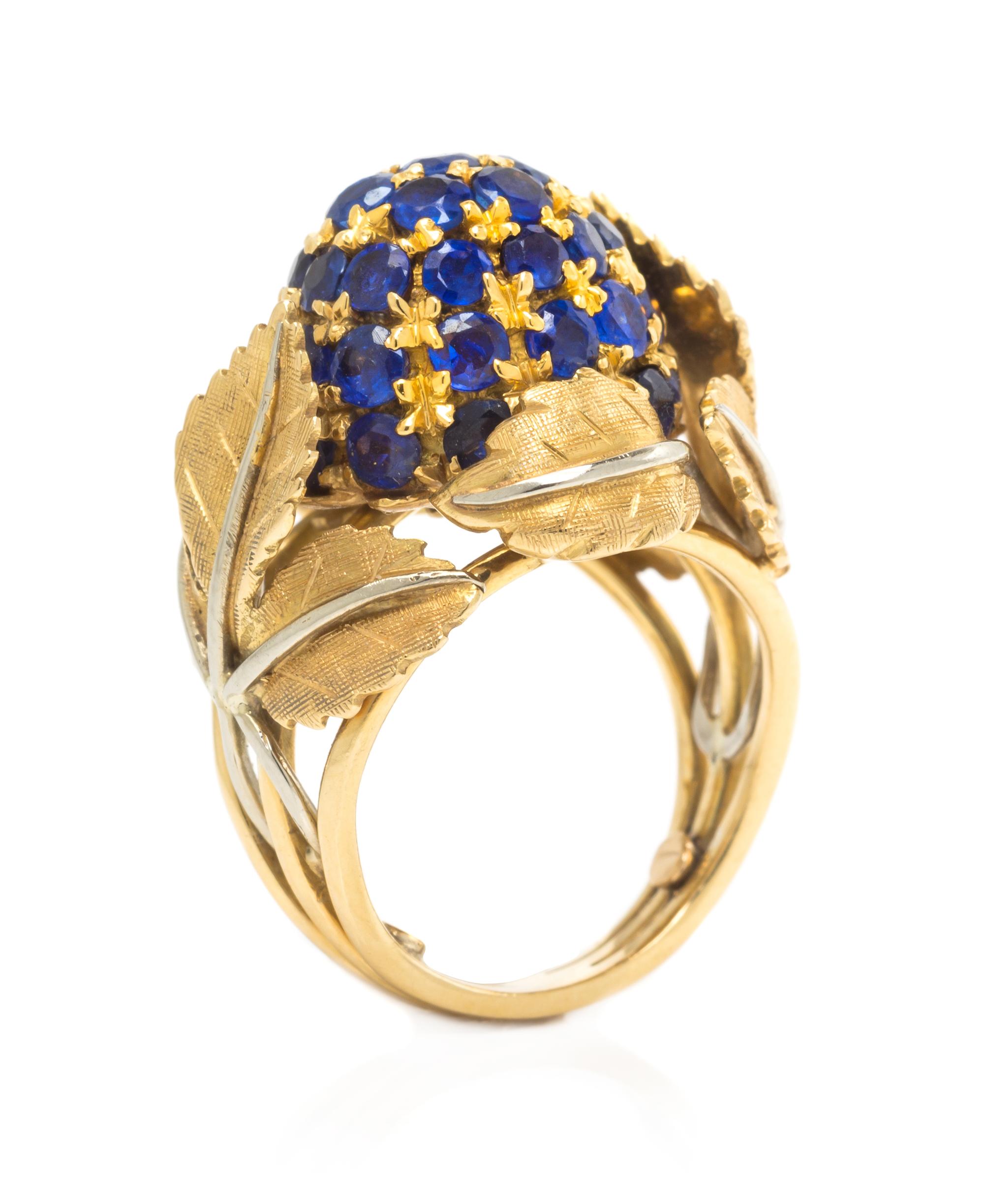 An 18 Karat Bicolor Gold and Sapphire Bombe Ring, Italian, 7.80 dwts.