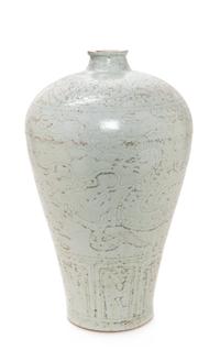 A Chinese Carved White Glazed Porcelain Meiping Vase Height 17 inches. — 20TH CENTURY