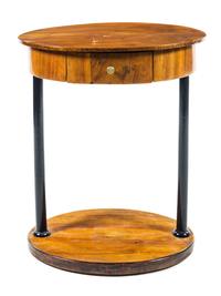 A Biedermeier Parcel Ebonized Birch Side Table Height 29 7/8 x width 24 3/4 x depth 18 1/4 inches. — CIRCA 1830