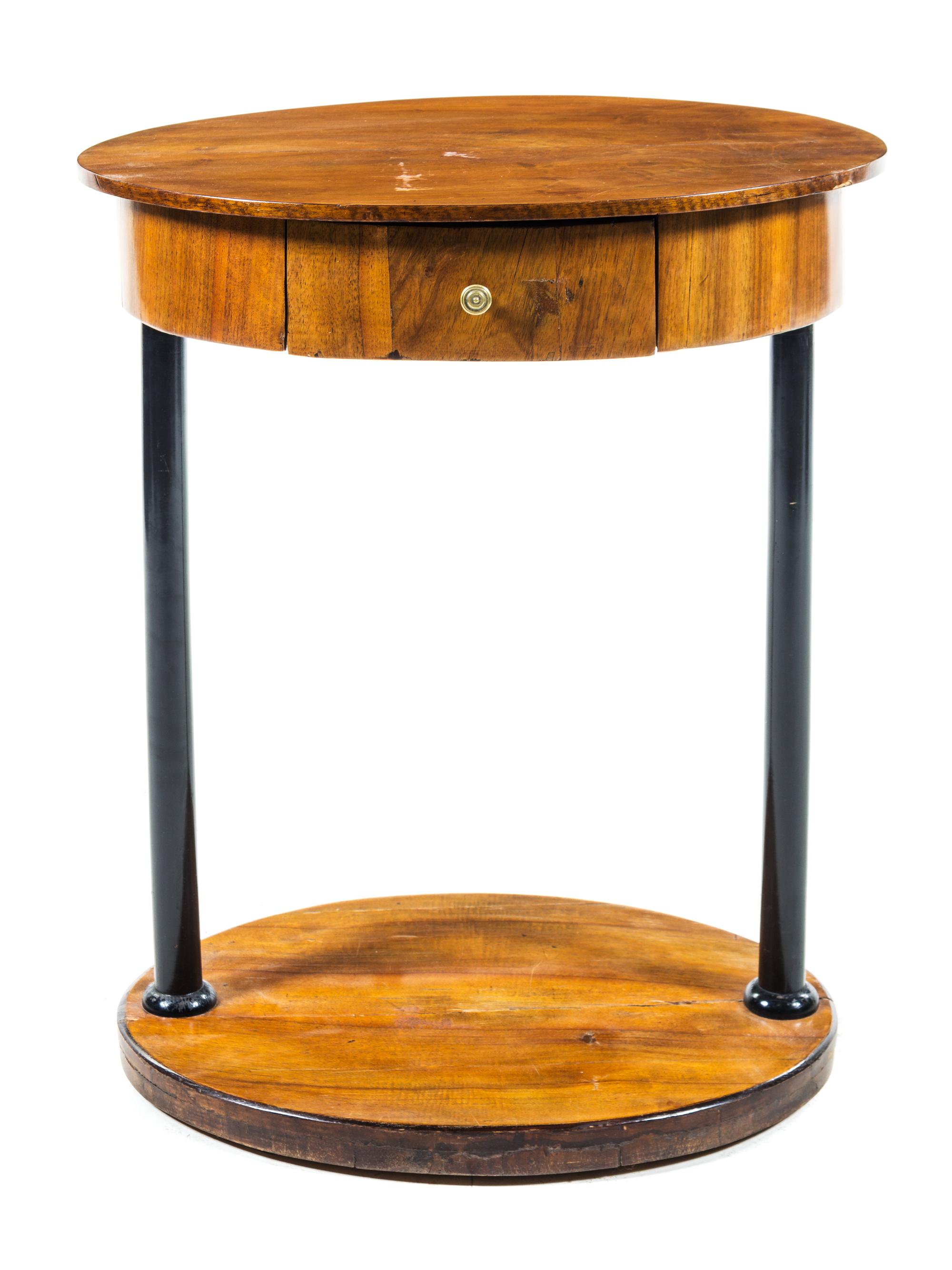 A Biedermeier Parcel Ebonized Birch Side Table Height 29 7/8 x width 24 3/4 x depth 18 1/4 inches. — CIRCA 1830