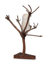A Folk Art Carving of a Snowy Owl Perched in Tree