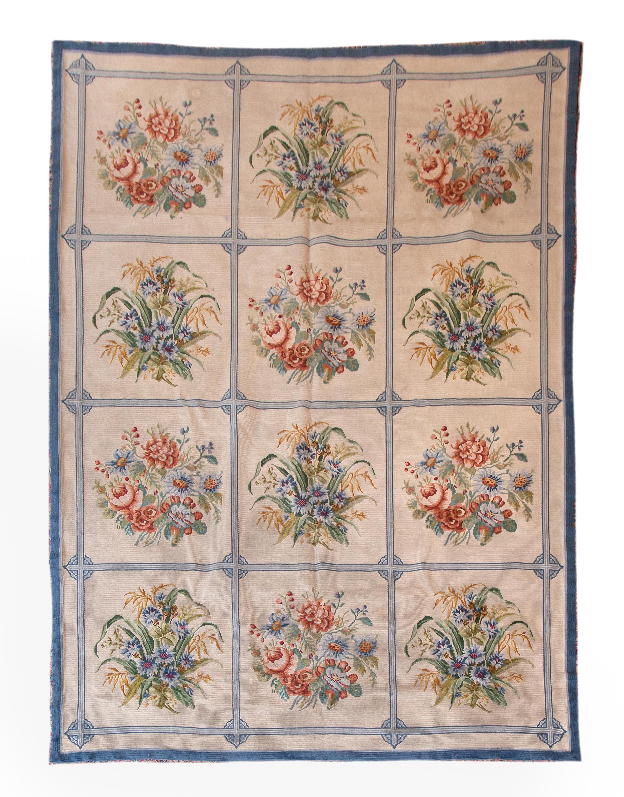 A Machine Made Floral Design Wool Rug