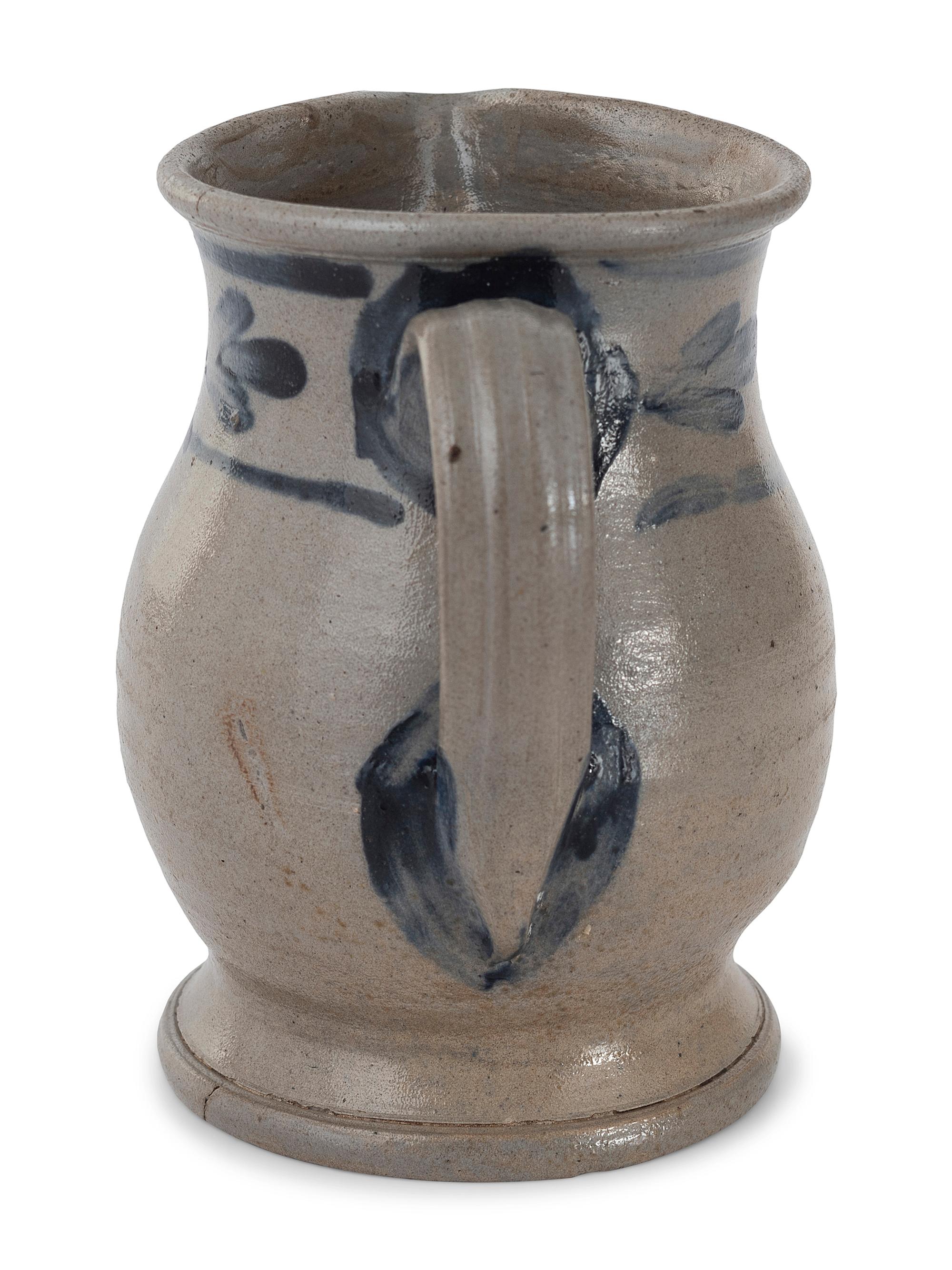 Three Cobalt Decorated Stoneware Pitchers