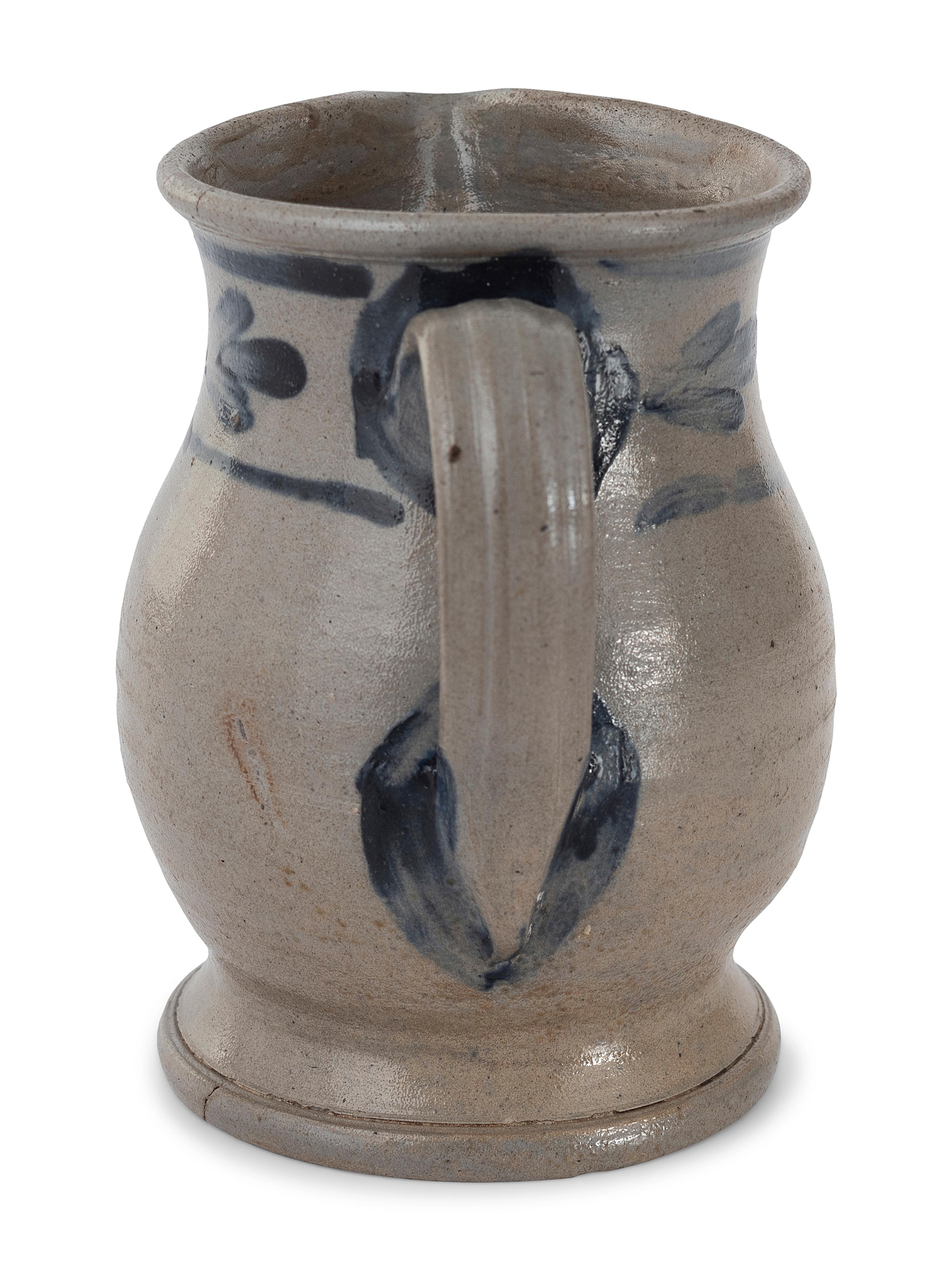 Three Cobalt Decorated Stoneware Pitchers