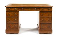 A William IV Burl Walnut Pedestal Desk, Height 31 x width 52 x depth 26 inches.