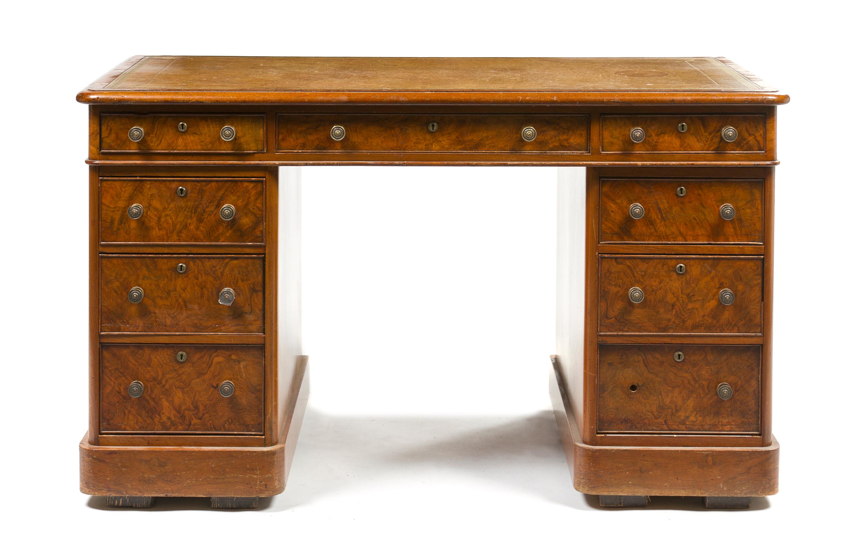 A William IV Burl Walnut Pedestal Desk, Height 31 x width 52 x depth 26 inches.
