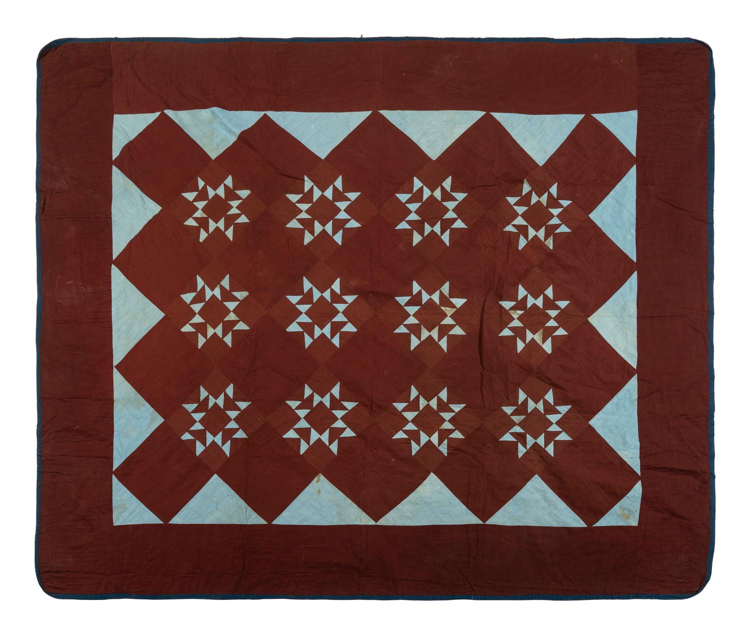 An Amish Cotton 'Eight-Pointed Star' Pattern Quilt
