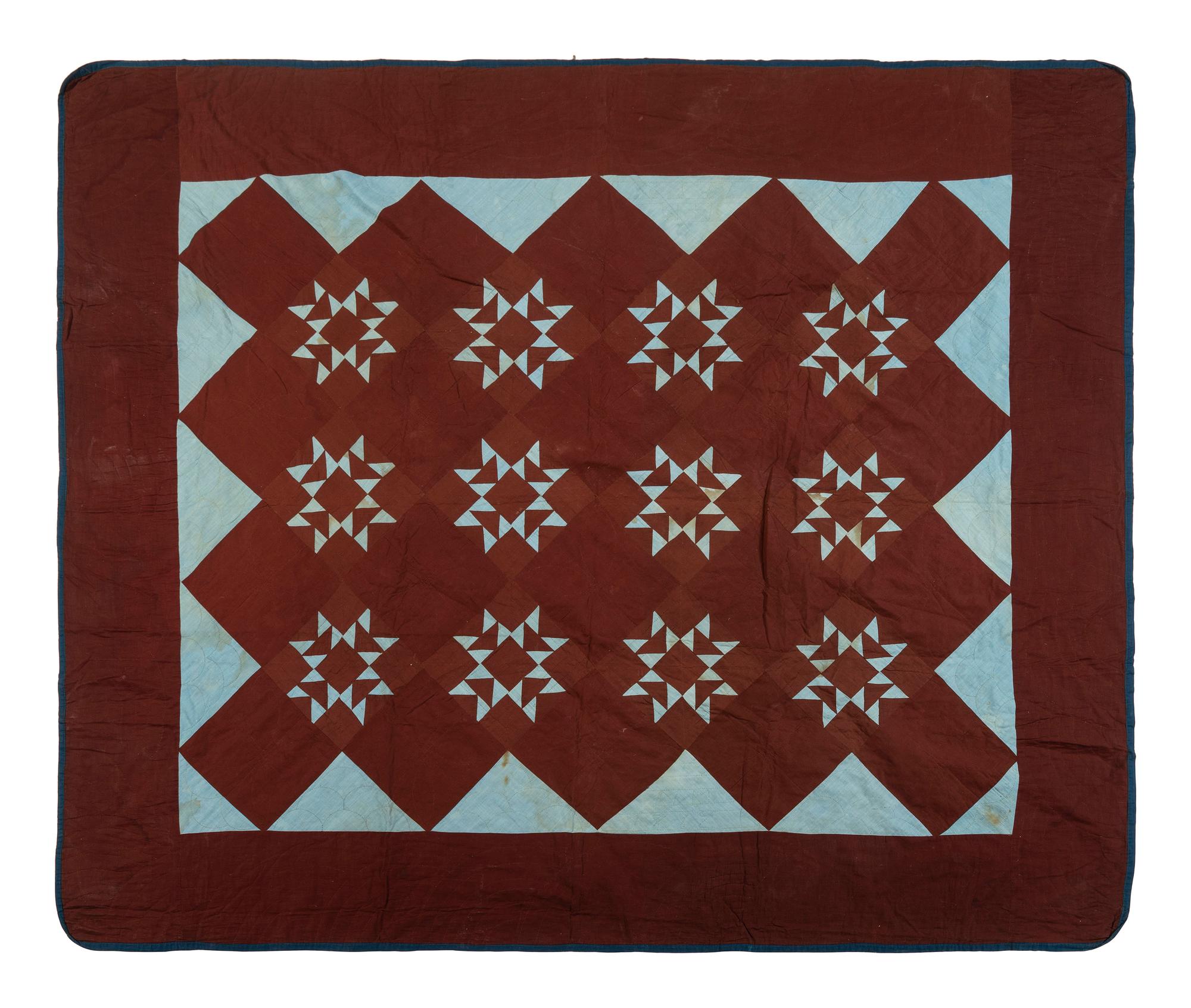 An Amish Cotton 'Eight-Pointed Star' Pattern Quilt