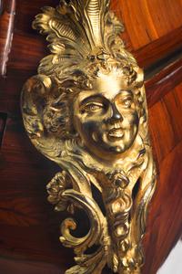 A Régence Gilt Bronze Mounted Marquetry Marble-Top Commode