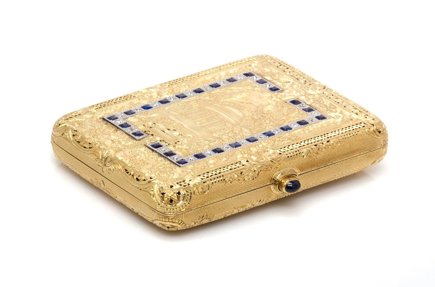 An 18 Karat Yellow Gold, Platinum, Ruby, Diamond and Sapphire Compact, 102.90 dwts.