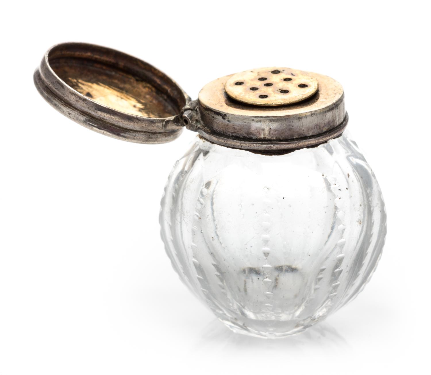 An English Silver Mounted Cut Glass Scent Bottle, Maker's Mark Likely IT, of ribbed, spherical form.