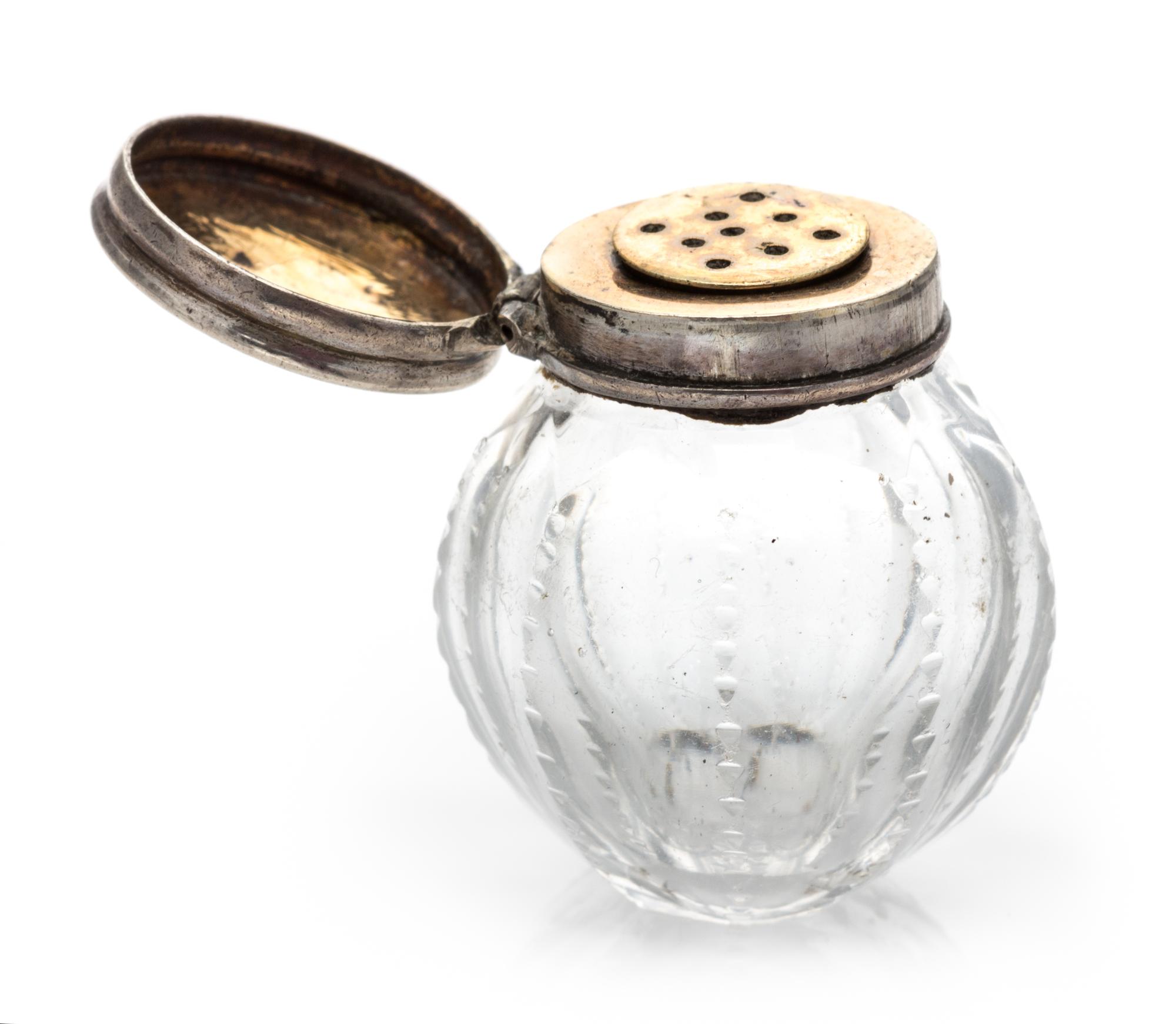 An English Silver Mounted Cut Glass Scent Bottle, Maker's Mark Likely IT, of ribbed, spherical form.