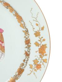 A Chinese Export Parcel-Gilt Armorial Porcelain Charger