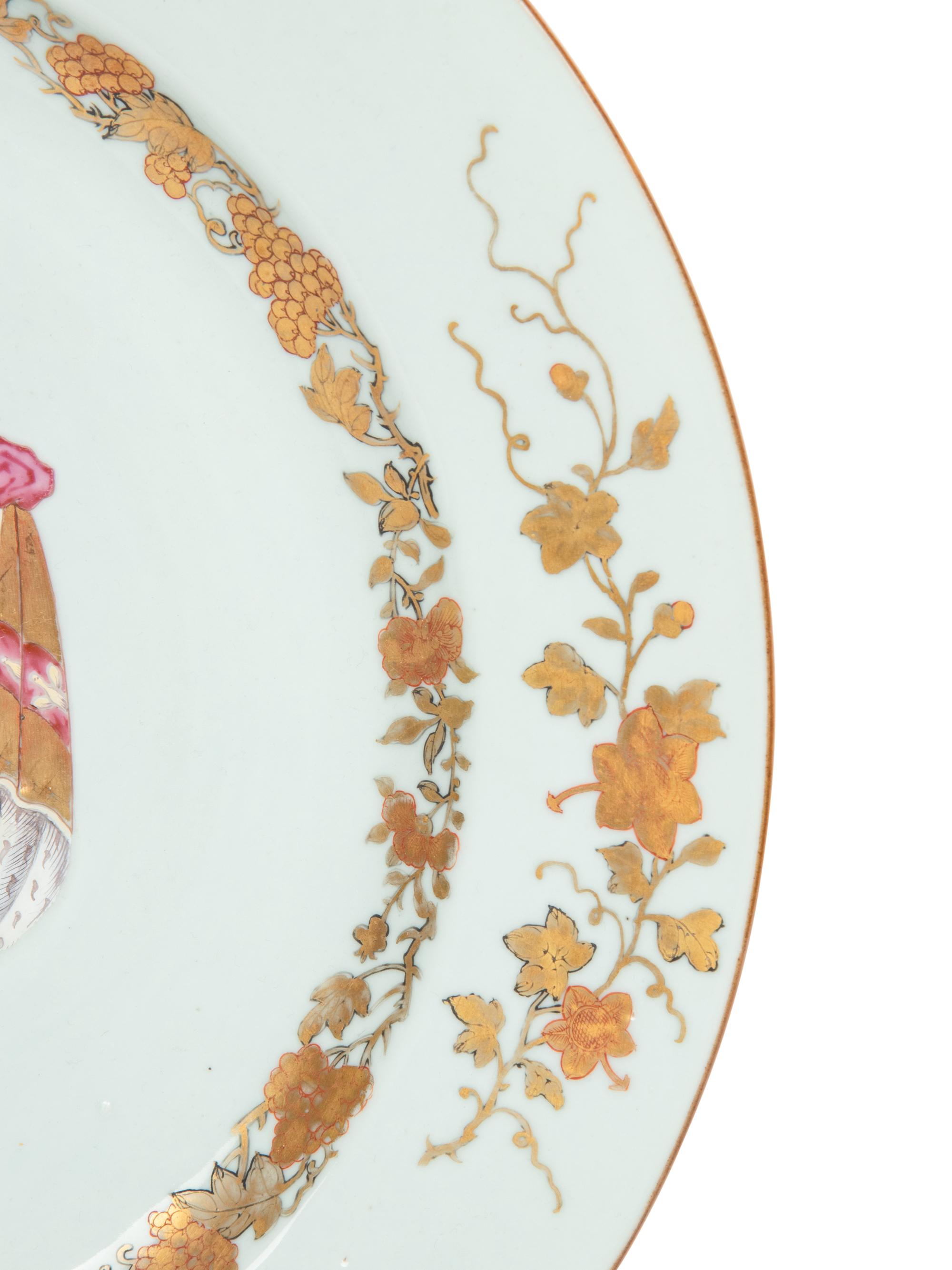 A Chinese Export Parcel-Gilt Armorial Porcelain Charger