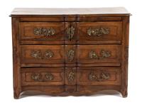 A Louis XV Provincial Style Walnut Commode