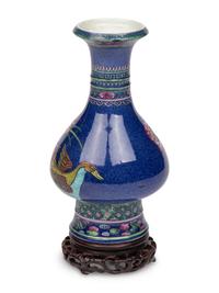 A Chinese Blue Ground Famille Rose Vase with Stand