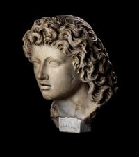 A Roman Marble Head of a Triton