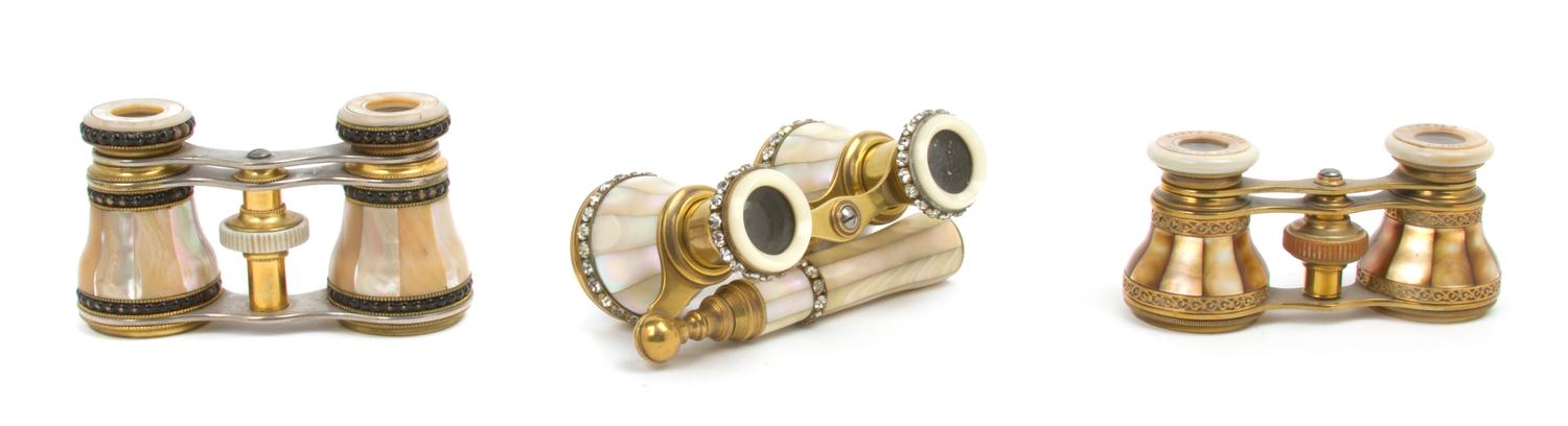 Three Pairs of French Mother-of-Pearl Veneered Opera Glasses, Width of widest 3 7/8 inches.