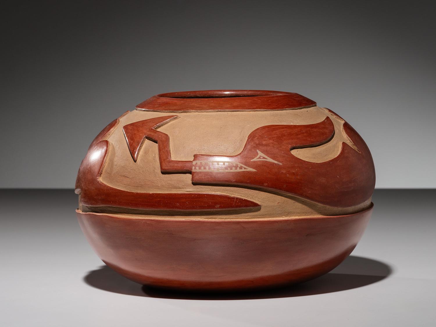 Carved Redware Pottery Jar, with Avanyu
