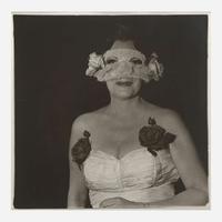 Diane Arbus (American, 1923-1971) Lady at a Masked Ball with Two Roses on her Dress, N.Y.C.