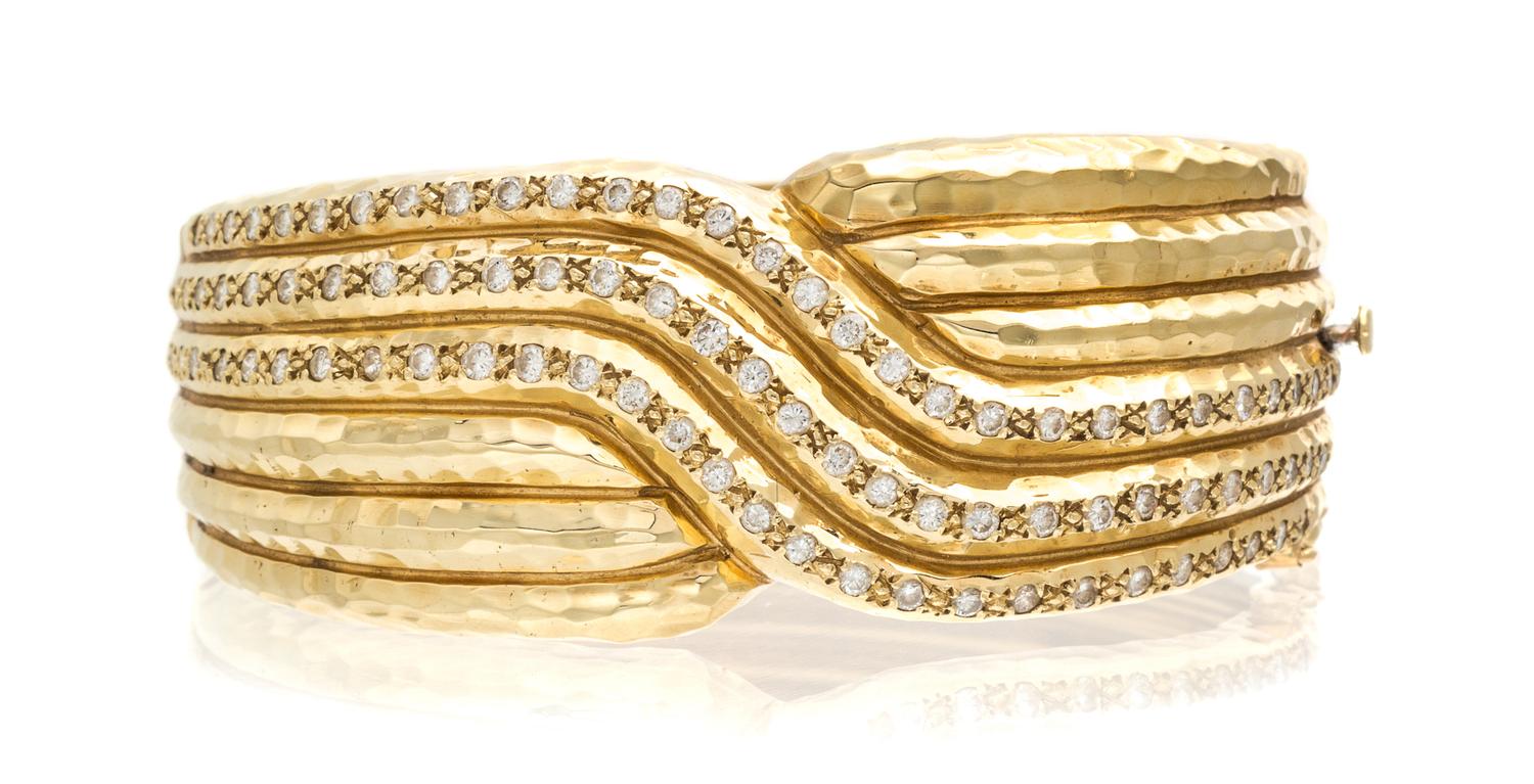 A 14 Karat Yellow Gold and Diamond Bracelet, 47.40 dwts.