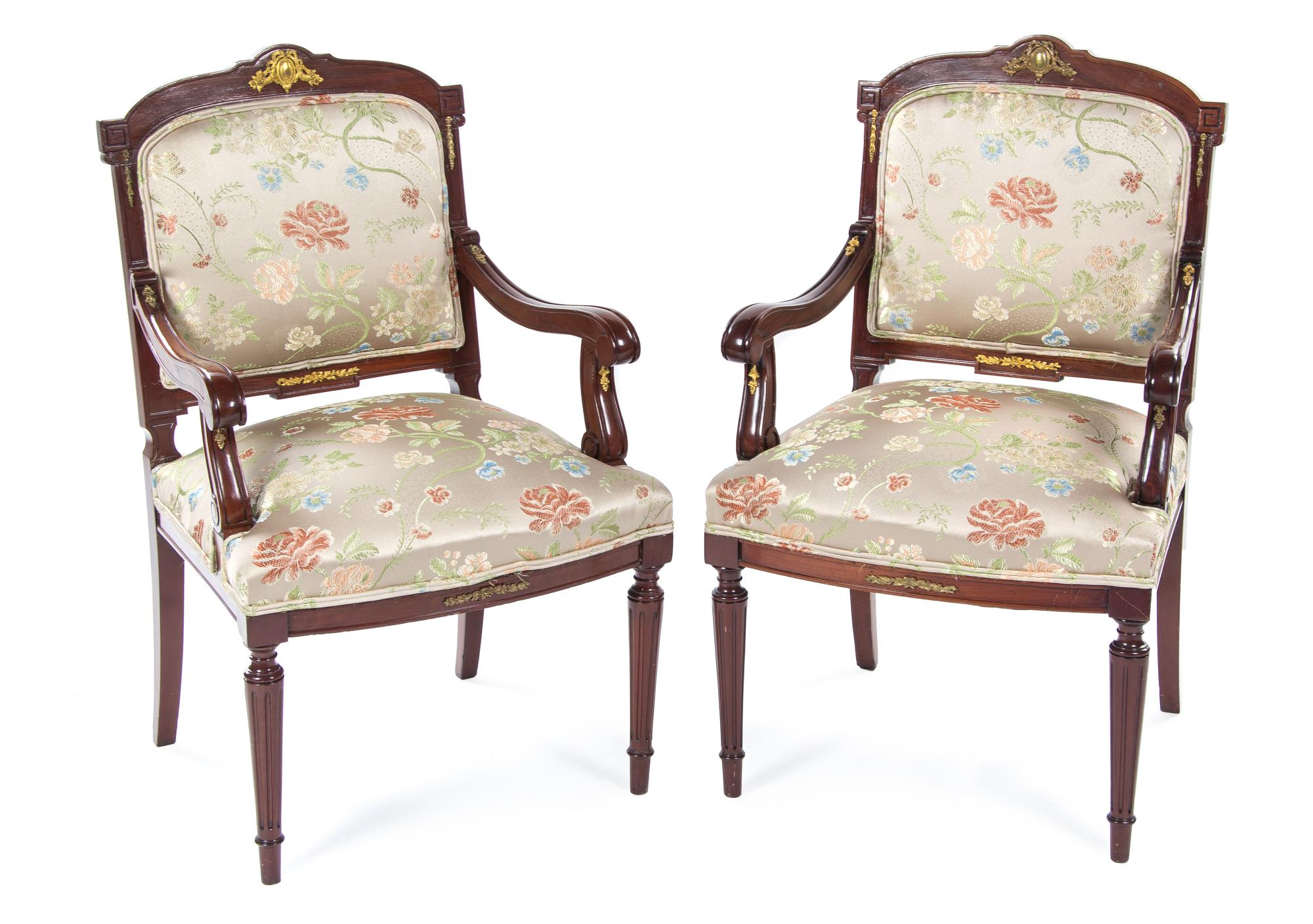 A Pair of Louis XVI Style Gilt Bronze Mounted Mahogany Fauteuils, EARLY 20TH CENTURY, Height 39 1/2. — EARLY 20TH CENTURY,
