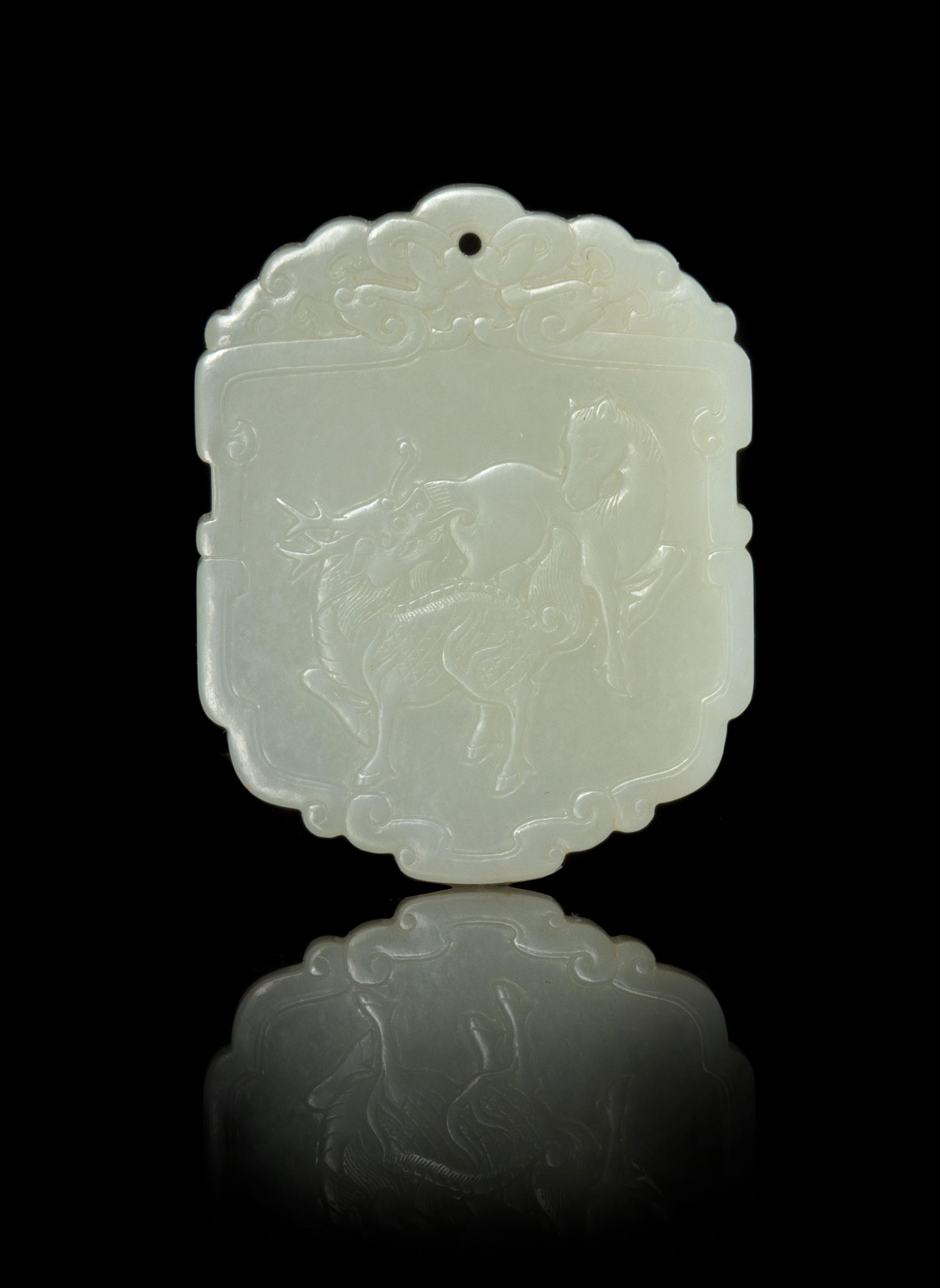 A White Jade Plaque Length 2 1/8 inches.