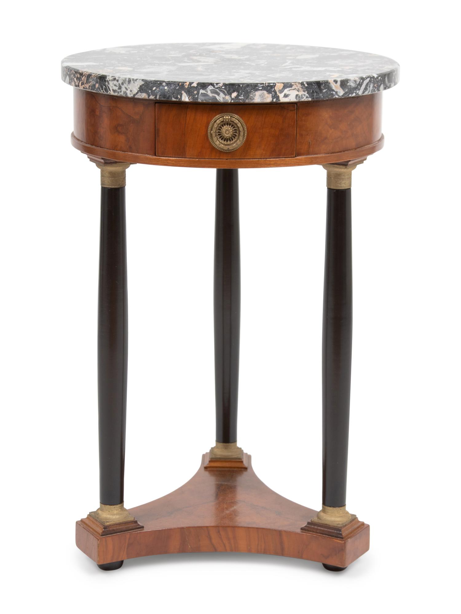 An Empire Style Part Ebonized Walnut Guéridon
