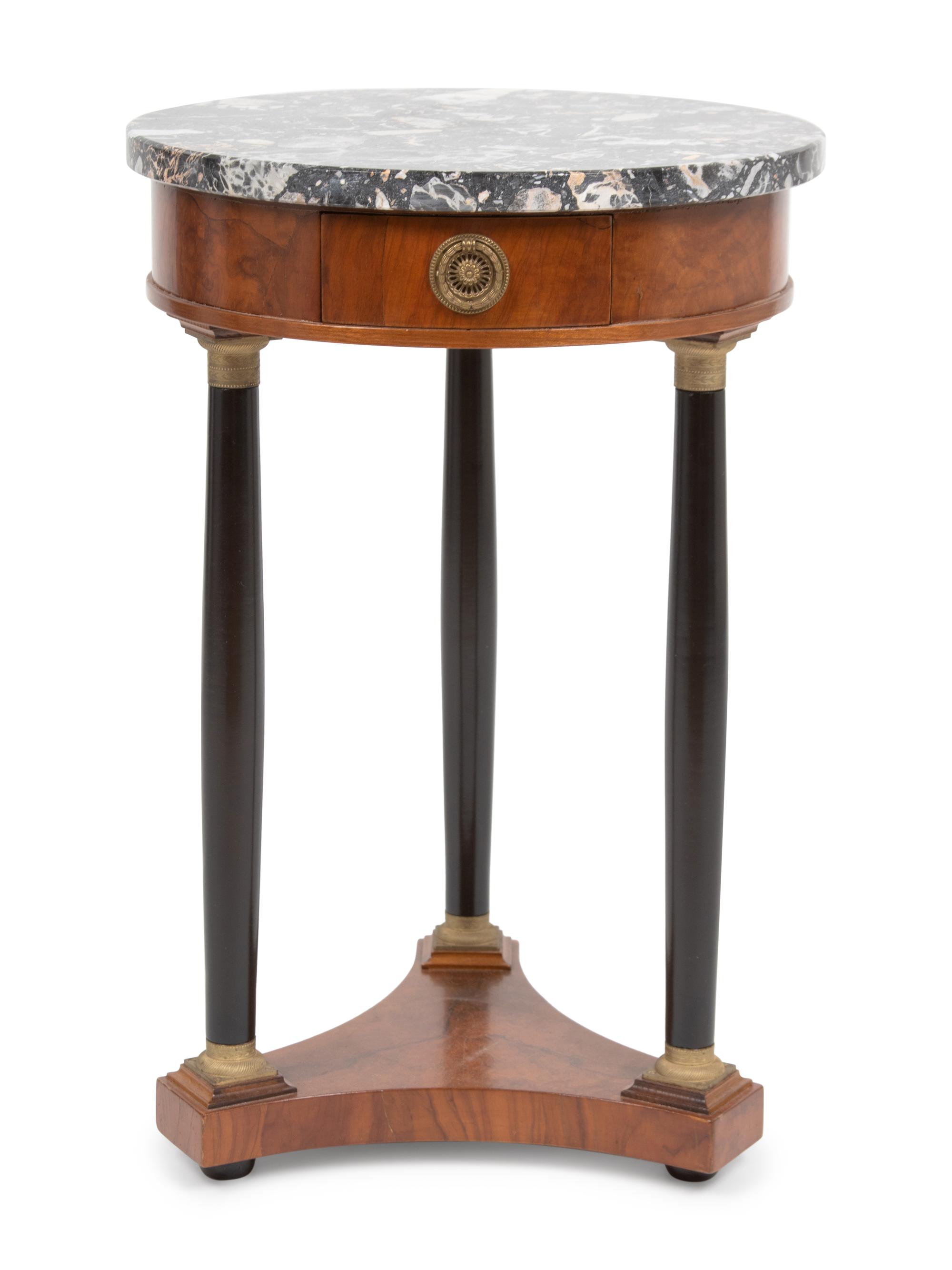 An Empire Style Part Ebonized Walnut Guéridon