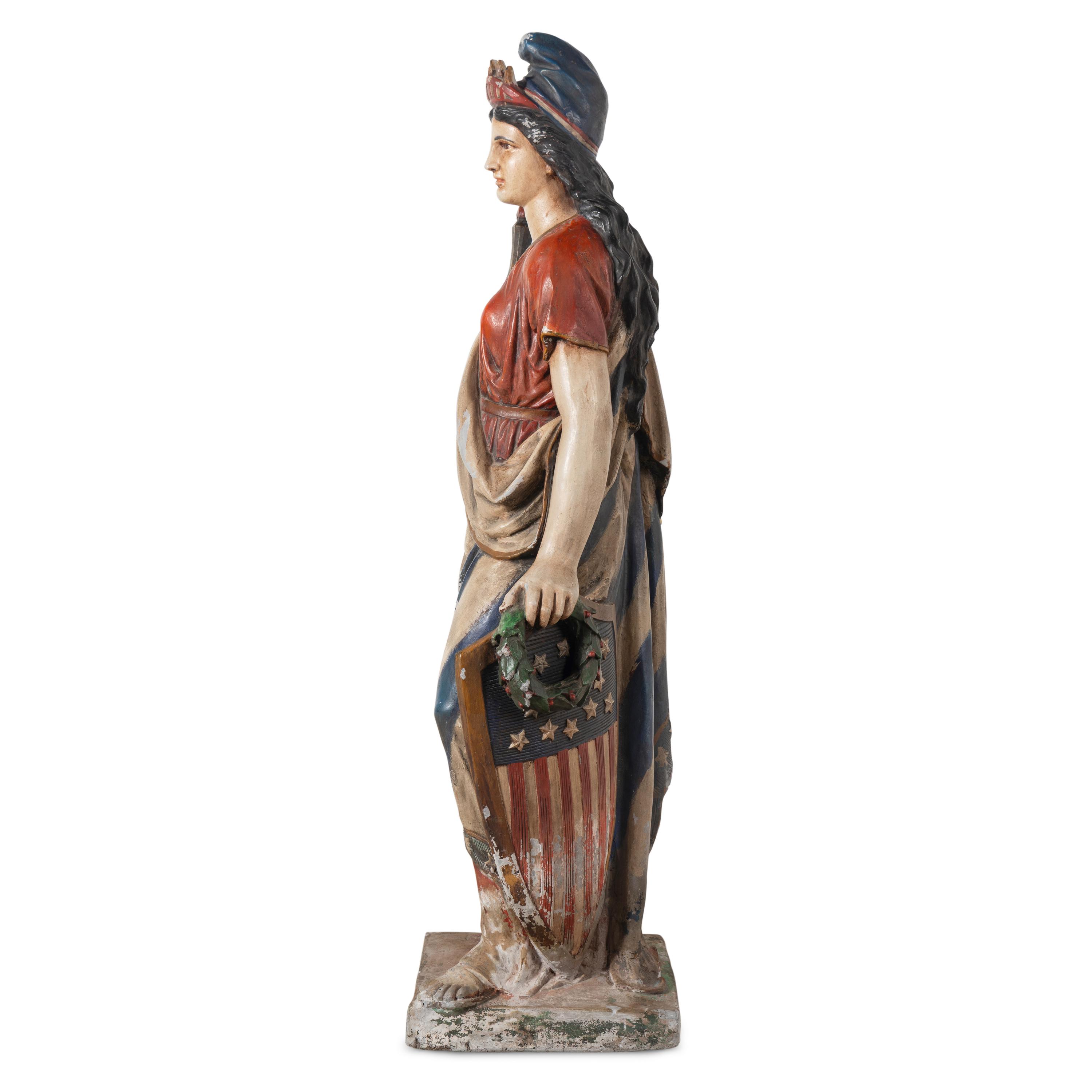A Polychrome Painted Cast Zinc Goddess of Liberty Figure