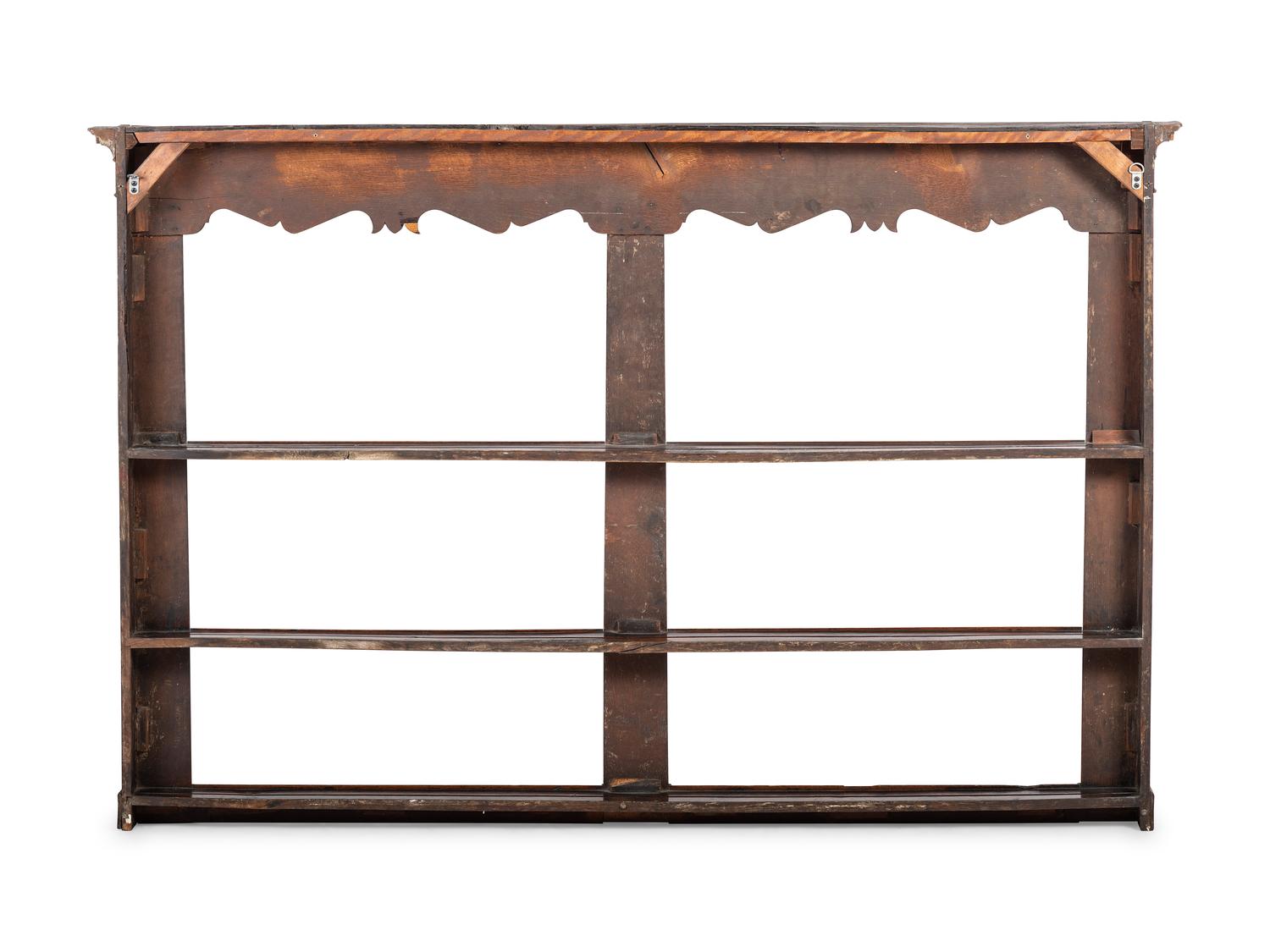 A Regency Inlaid and Carved Walnut Hanging Pewter Rack