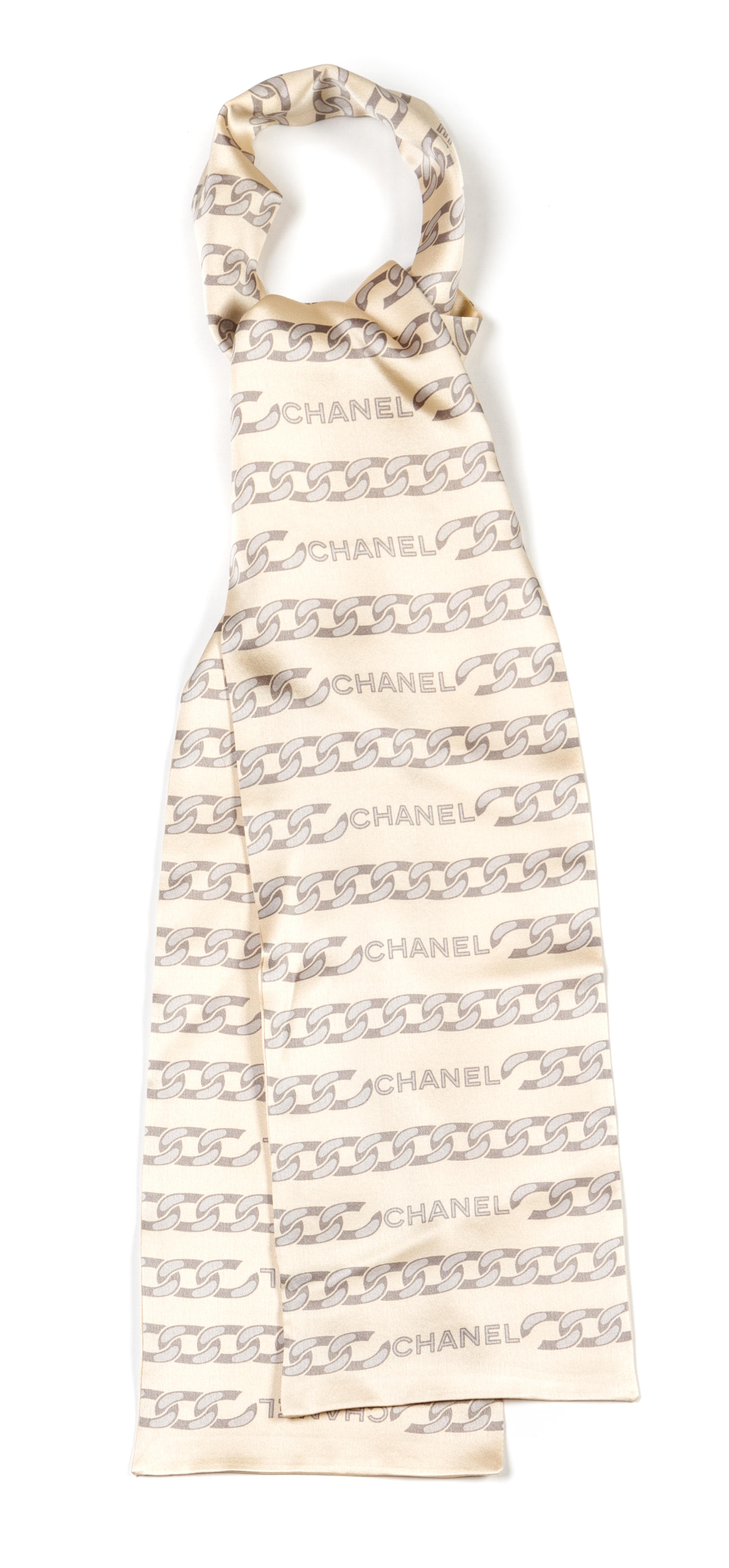 Two Chanel Silk Scarves, 24 x 21 inches.