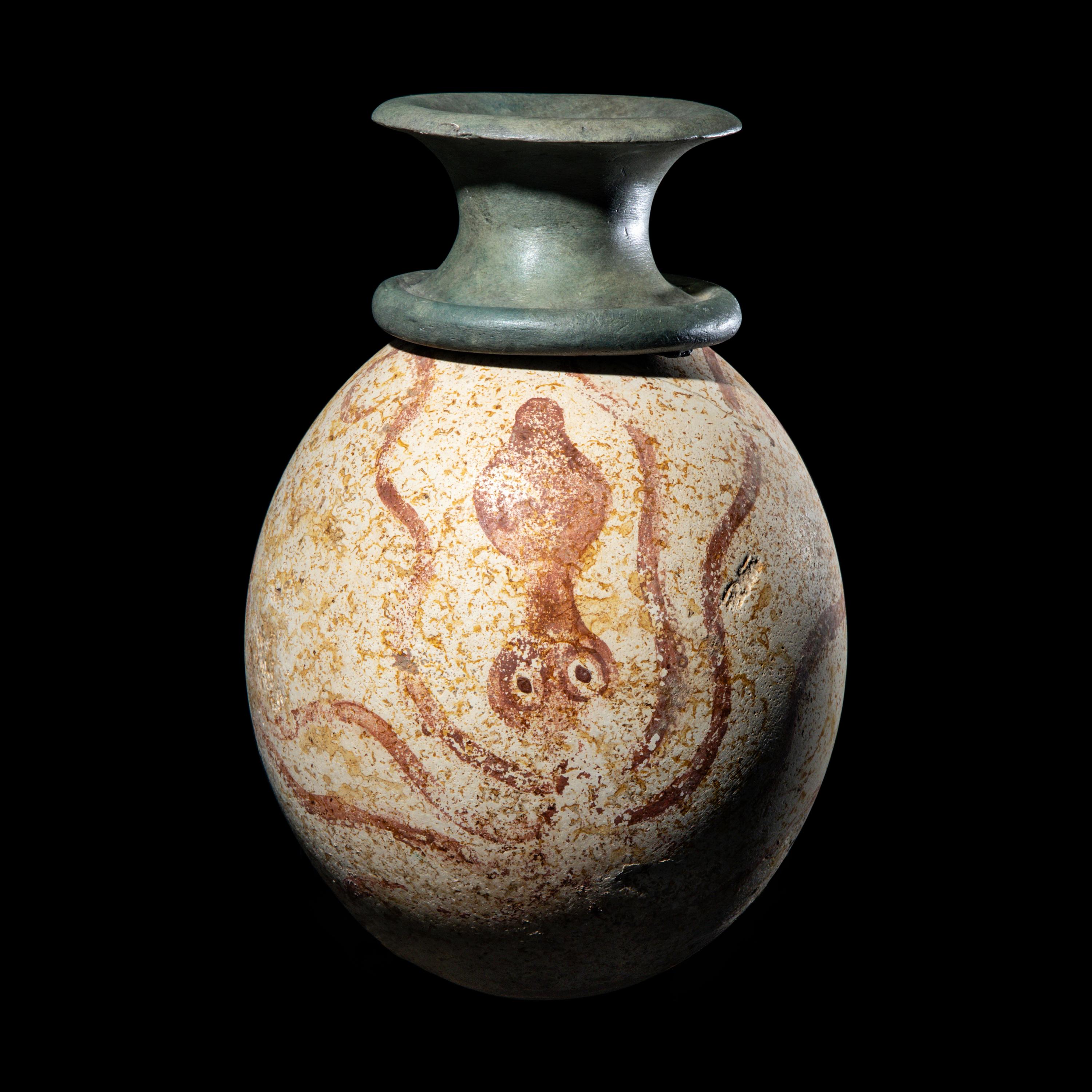 A Minoan or Mycenaean Painted Ostrich Egg Rhyton