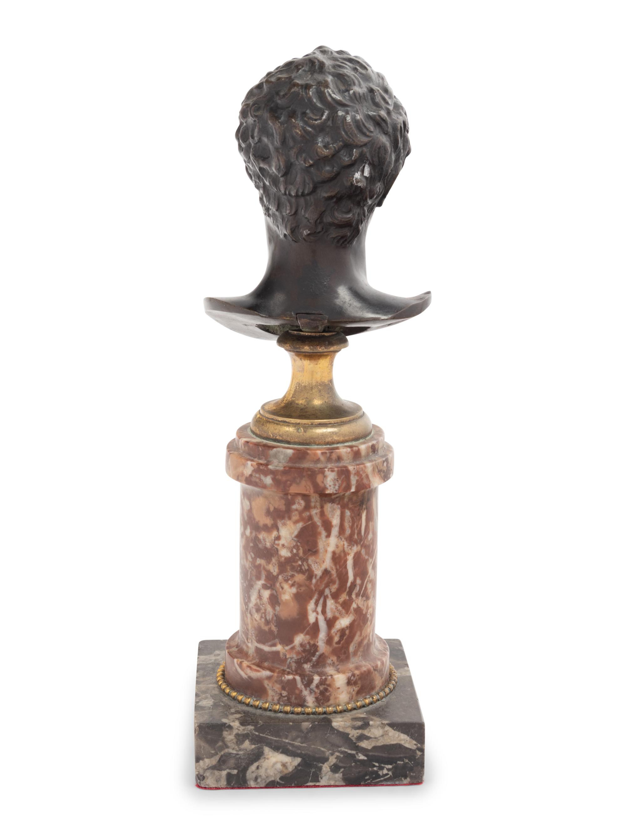 A Grand Tour Bronze Bust on a Bi-Color Marble Socle