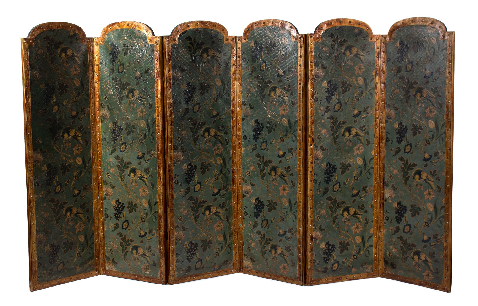A Continental Embossed and Polychromed Leather Six-Fold Floor Screen