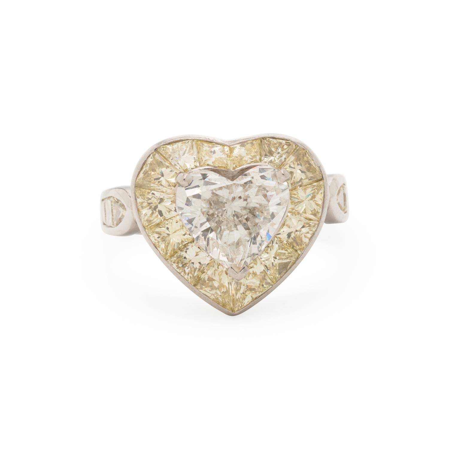OSCAR HEYMAN, HEART SHAPED DIAMOND AND YELLOW DIAMOND RING