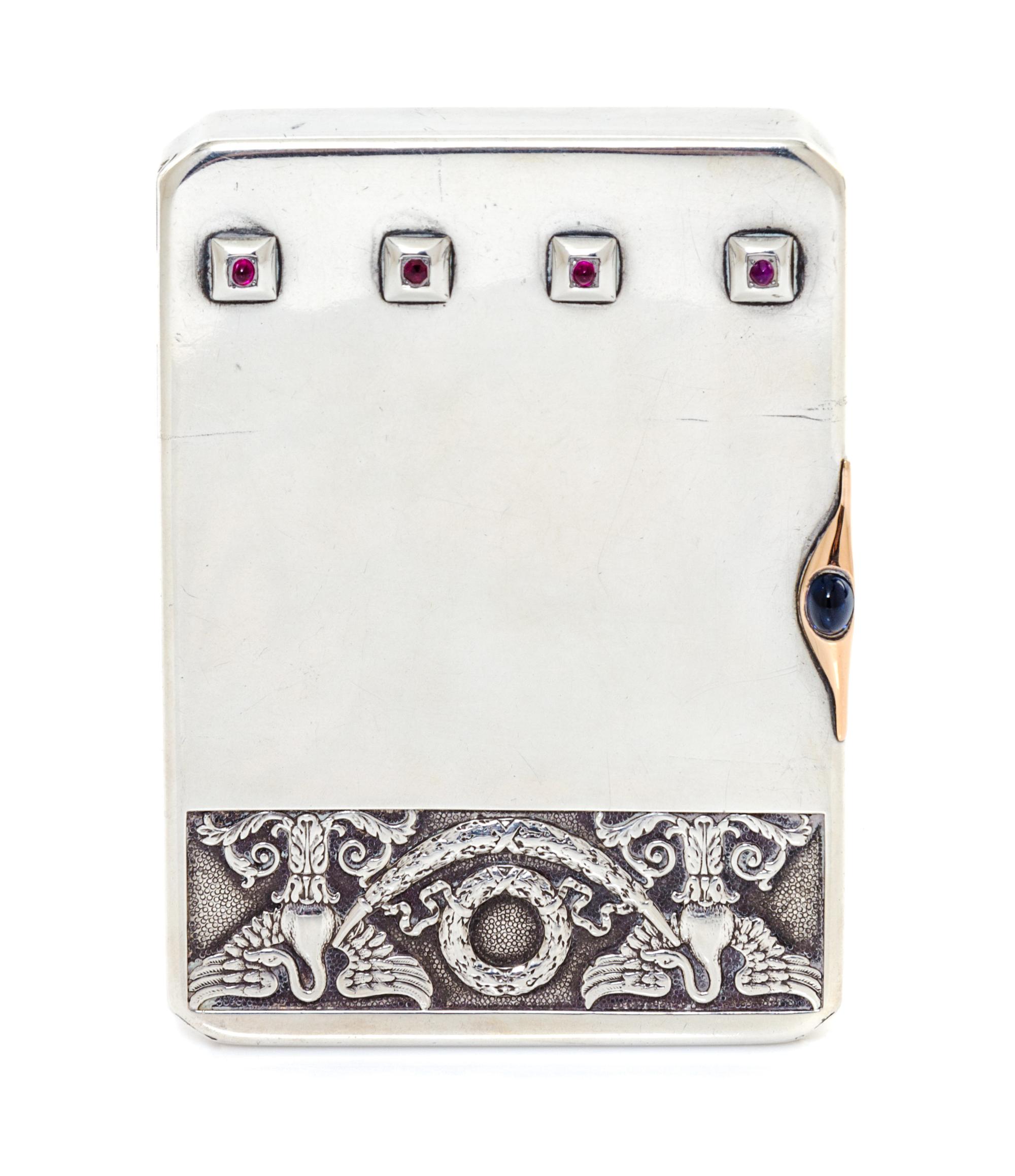 A Russian Ruby and Sapphire Inset Silver Cigarette Case, Mark of Faberge with Imperial warrant, Moscow, 20th century, the lid worked to