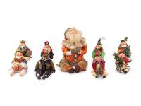 A Group of Eight Papier-Mâché Figures of Elves