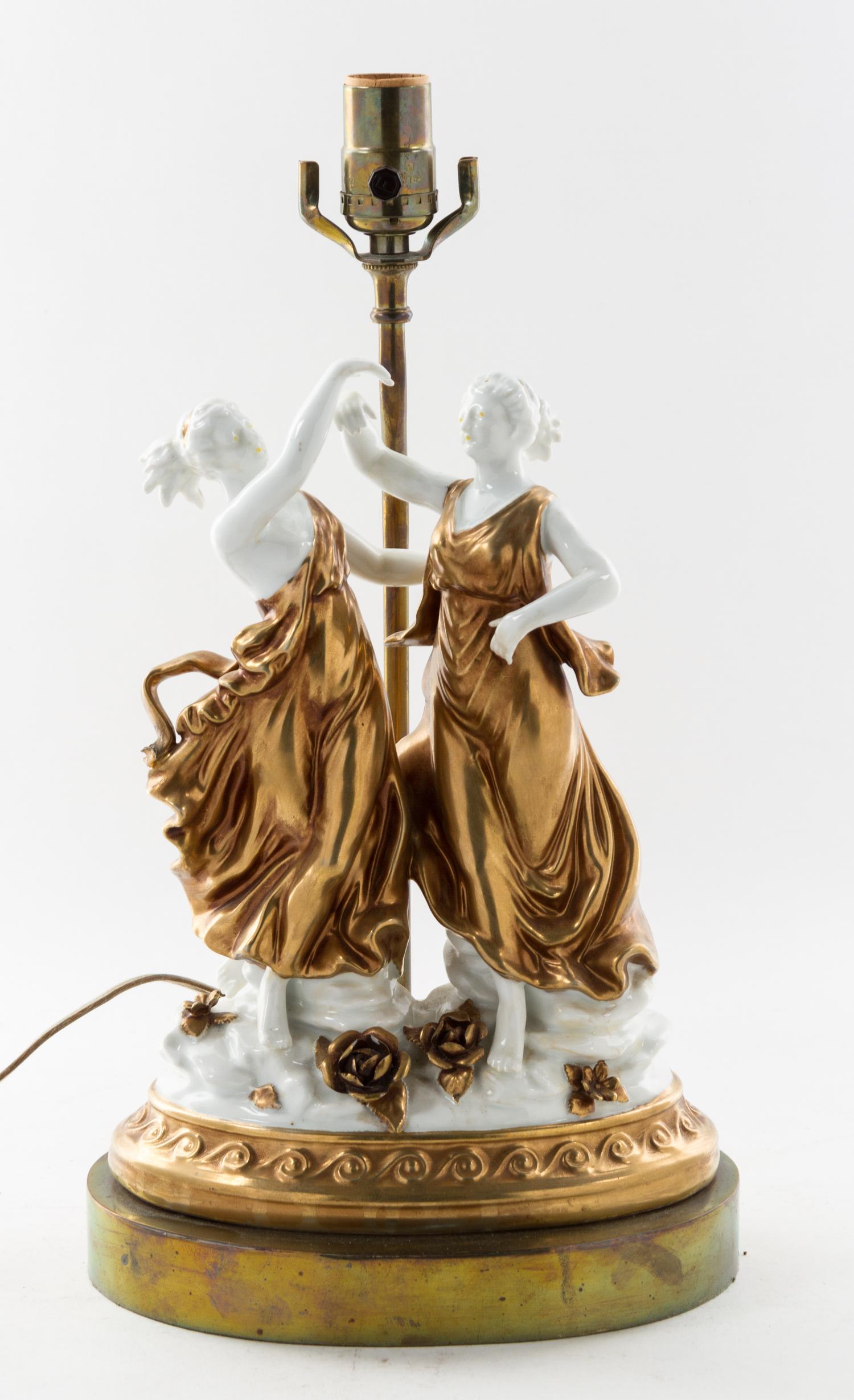 A Capodimonte Gilt Decorated Porcelain Figural Group Height of porcelain 12 inches. — 20TH CENTURY
