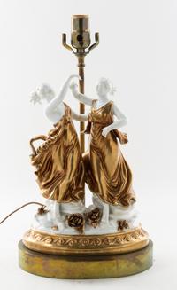 A Capodimonte Gilt Decorated Porcelain Figural Group Height of porcelain 12 inches. — 20TH CENTURY
