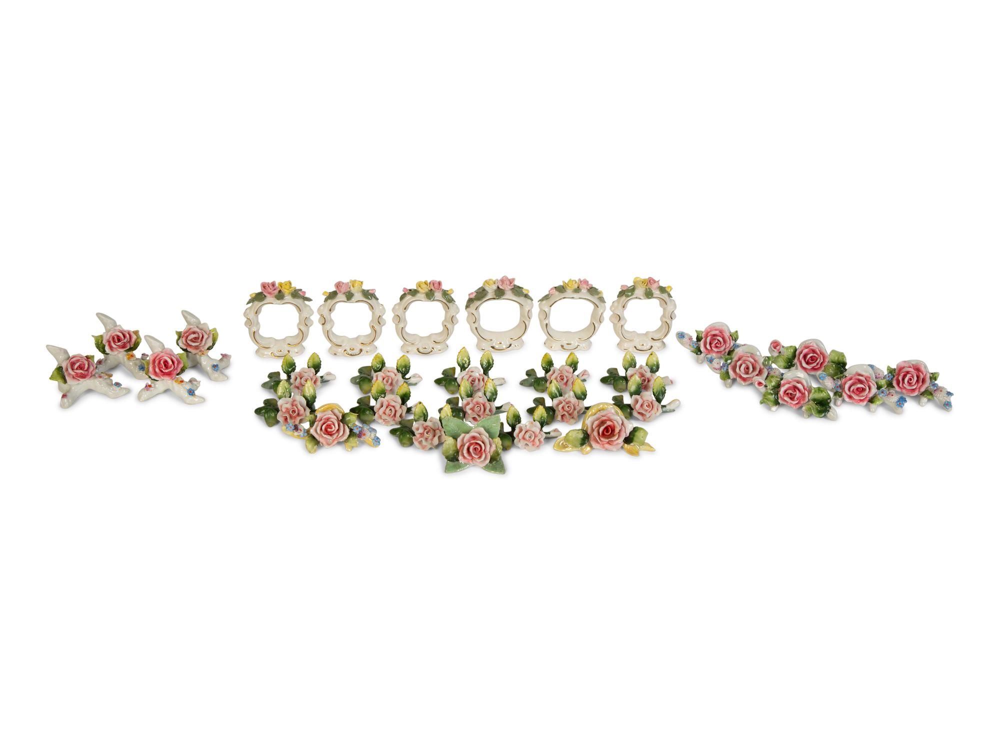 A Collection of Dresden Porcelain Place Cards, Holders and Napkin Rings